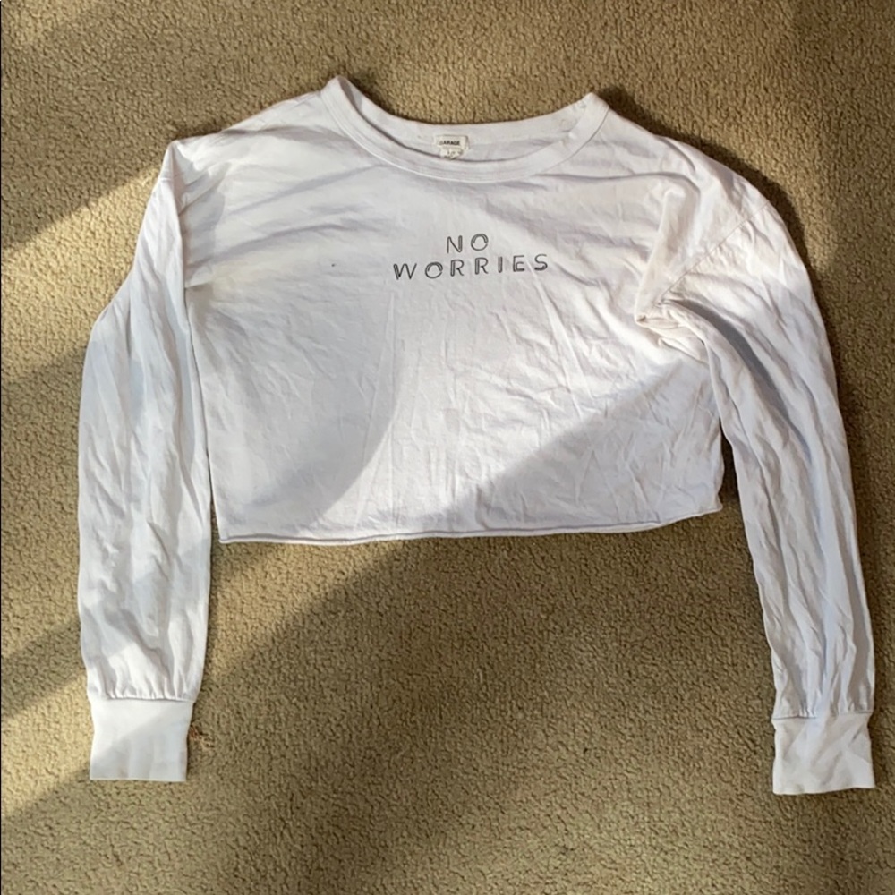 Long sleeve crop top with “no worries” on front